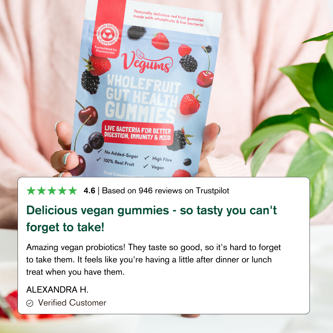 Vegums wholefruit probiotic gummy packet with five star customer review below plant on the bright side white background