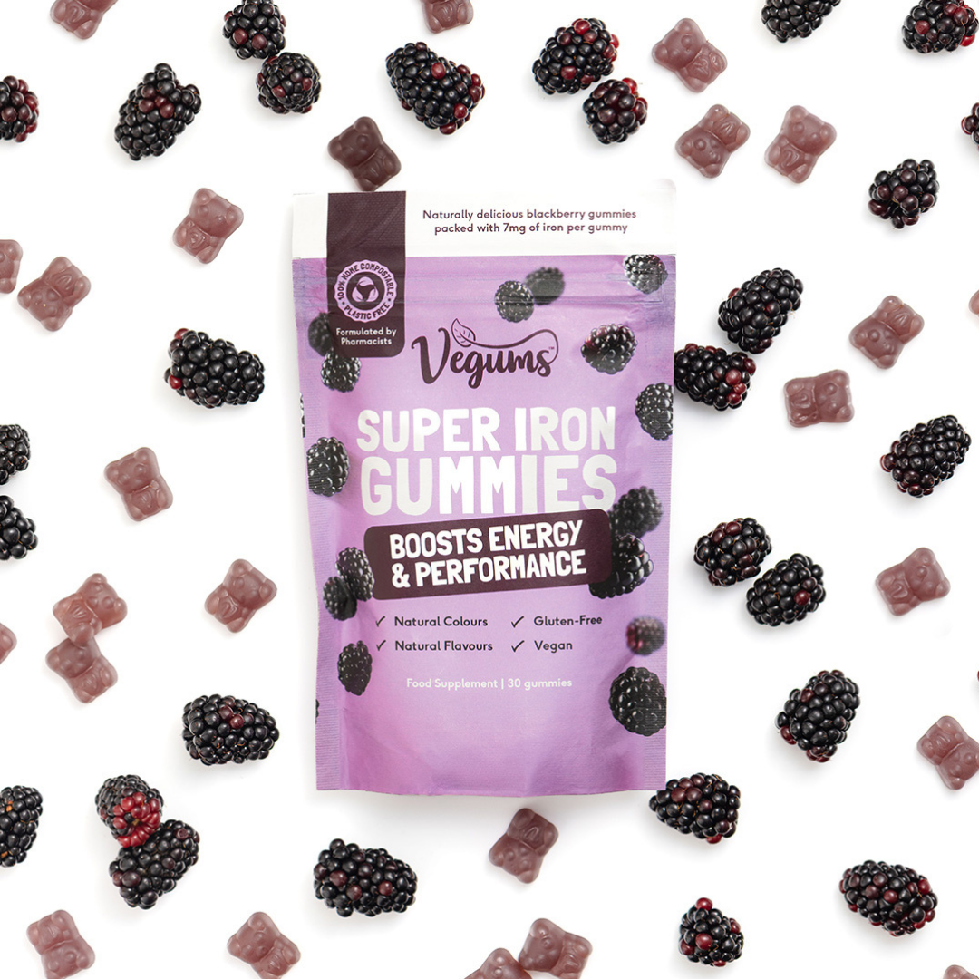 vegums super iron gummies in eco packaging with berries and bear surrounding packet