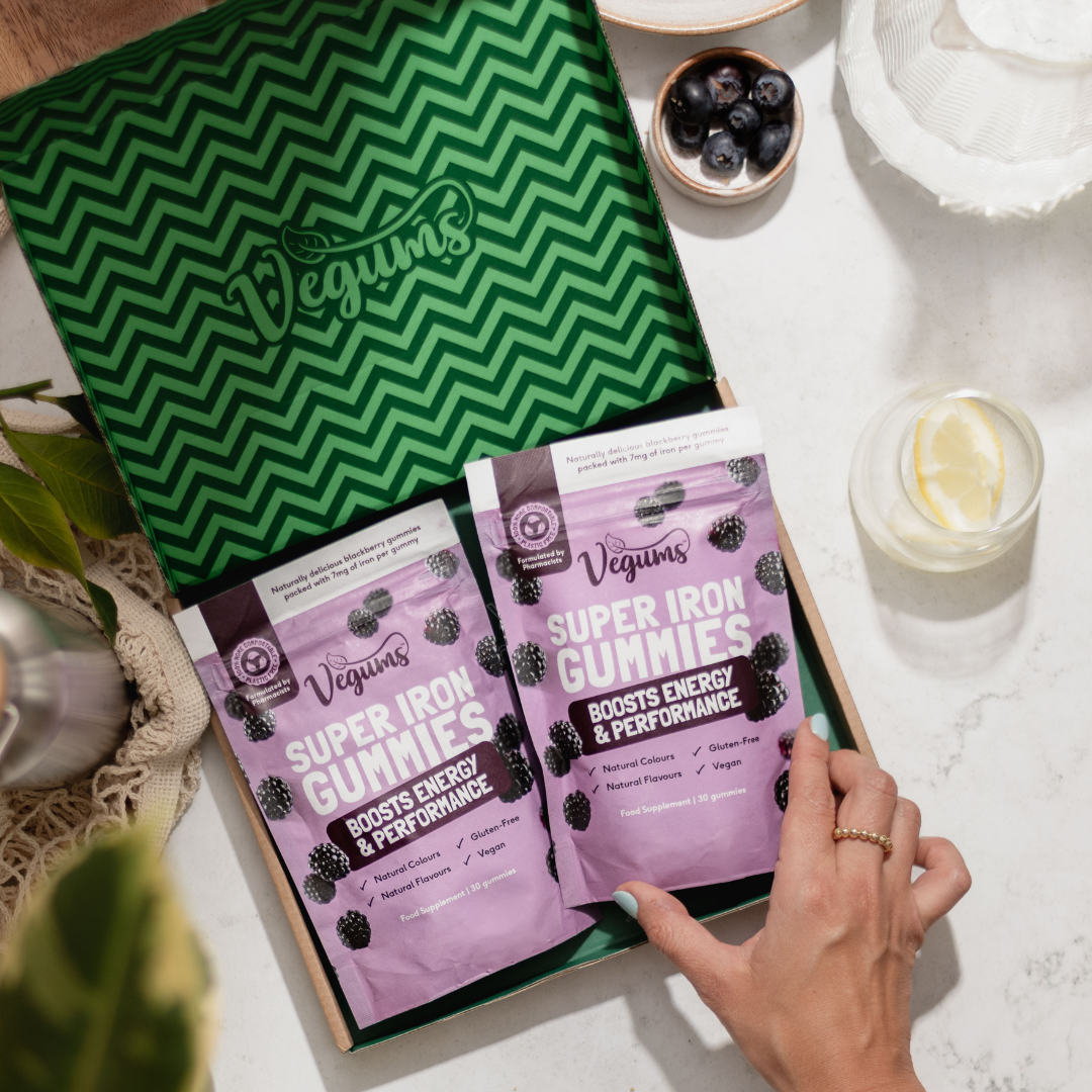 Vegums UK vegan vitamin brands eco packaghing with blackberries natural photo setting