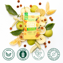 Vegums Whole Fruit Vitamin C Gummies packaging surrounded by fruits and leaves on a white background