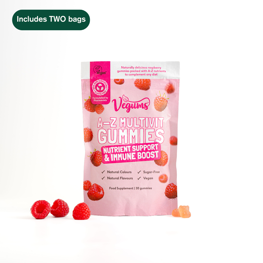 Vegums A-Z Multivit Gummies packaging with raspberries on a white background