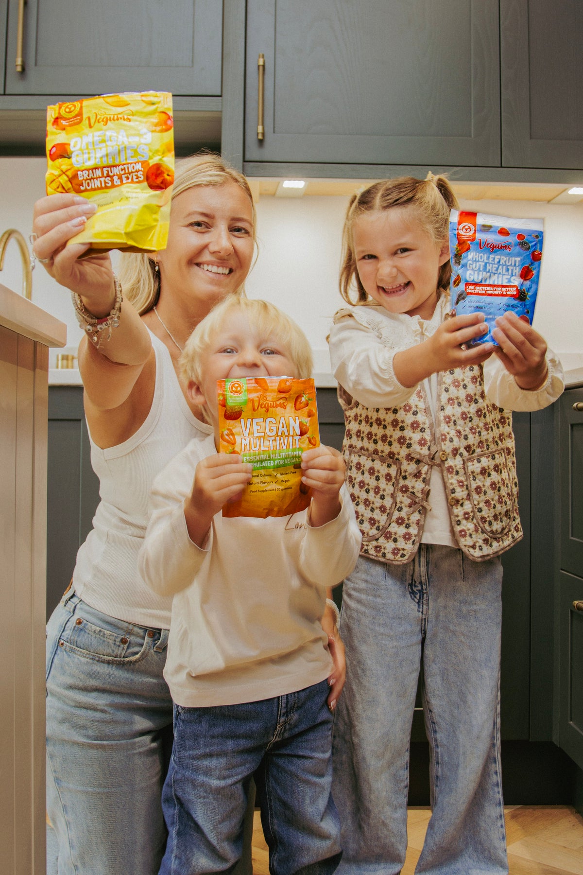 VGKIDS02 Children at the table with Vegums kids vitamins